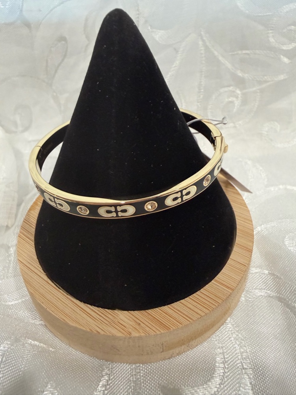 Coach Gold-Tone Bracelet with Black and White Enamel and Crystal - Picture 2 of 6